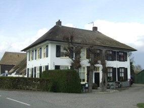 Ooijse Bandijk 10-12 te Ooij: De Grote Kat